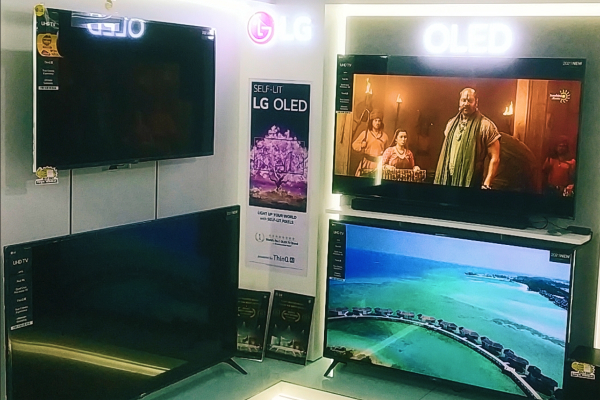 LG OLED television wall inside the Nipun Radios showroom